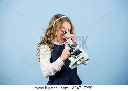 Science Research In Lab. Small Genius Girl With Microscope. Education And Knowledge. Small Girl Scie