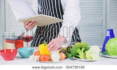 Culinary Arts Concept. Man Learn Recipe. Improve Cooking Skill. Ultimate Cooking Guide For Beginners