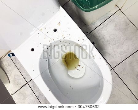 Overhead Close-up Of A Toilet In Extremely Insanitary Conditions