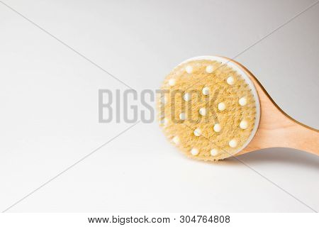 Body Massage Brush On Grey Background. Massage Brush For The Body. Skin Care Products. Spa Massage B