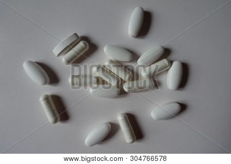 White Caplets Of Calcium Citrate And Capsules Of Magnesium Citrate From Above