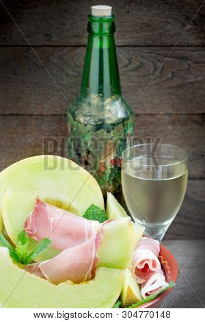 Melon (cantaloupe) With Prosciutto And Wine Onrustic Table