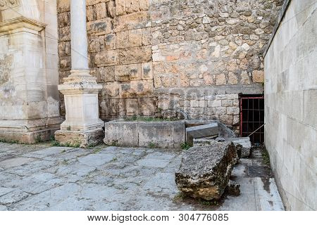 Stones At The Entrance To The Inside Of The Building At The Gates Of Hadrian. Adrian Gate, Antalya L
