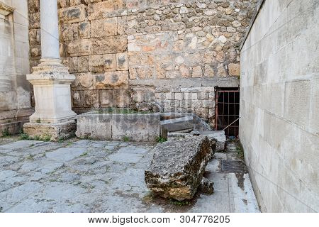 Stones At The Entrance To The Inside Of The Building At The Gates Of Hadrian. Adrian Gate, Antalya L