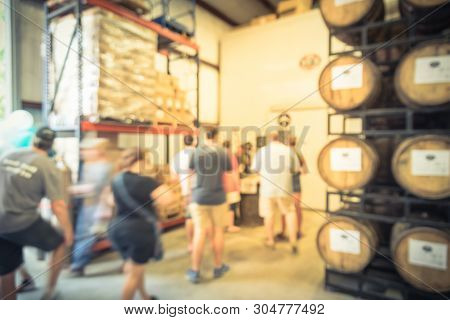 Blurry Background Customer Queue To Taste Draft Beer From American Brewing Taproom