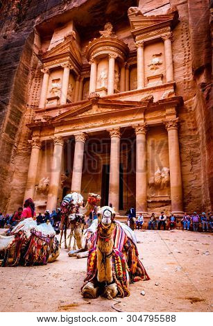 Pertra, Jordan - 29 March 2019: Large interesting tourist complex of the ancient city of Petra with tourists and camals
