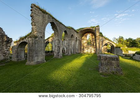 Ancient Ruins Of The Alvastra Monastery In Sweden Under A Blue Sky A Beautiful Summer Morning