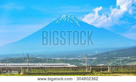 2017 May 31. Shizuoka Japan. Running High Speed Train Tokaido Shinkansen And Fuji Mountain With Rice