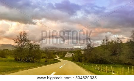 Beautyfull Mountain Road To Sunset. Road On Mountain Willage.