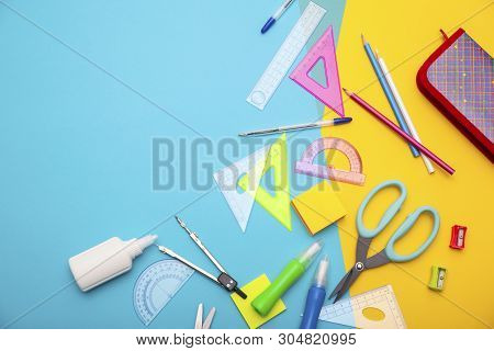 Starting School, Back To School, Education Are Styled Flat Lay Scene With School Supplies On Blue An