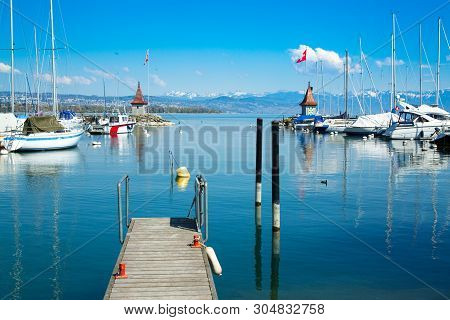 Picturesque Little Port And Sailing Boats On Lake Geneva In Morges