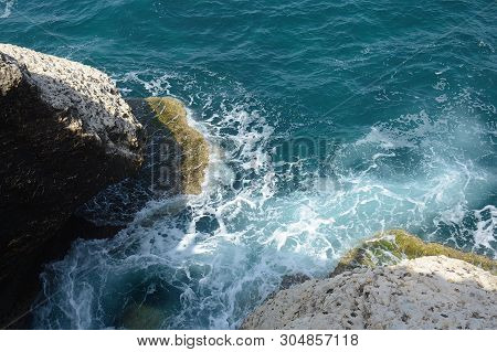 Rosh Ha Nikra. Israel. Sea Waves And White Rock. A Unique Tourist Attraction Located On The North-we