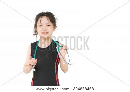 Pretty Asian Girl In Sportswear Wears Green Stechoscope And Posing To Camera, Studio Shot On White B