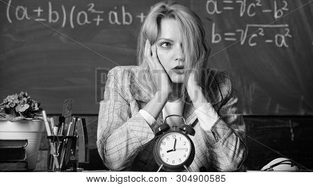 Time Management. Teacher With Alarm Clock At Blackboard. Time. Study And Education. Modern School. K