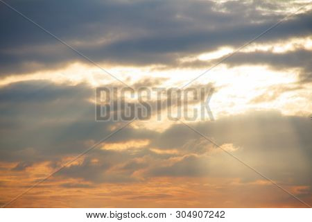 Evening Weather, Golden Cloud And Sky With Sun Light Are Shone Through The Clouds Look Feel Good.