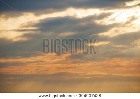 Evening Weather, Golden Cloud And Sky With Sun Light Are Shone Through The Clouds Look Feel Good.