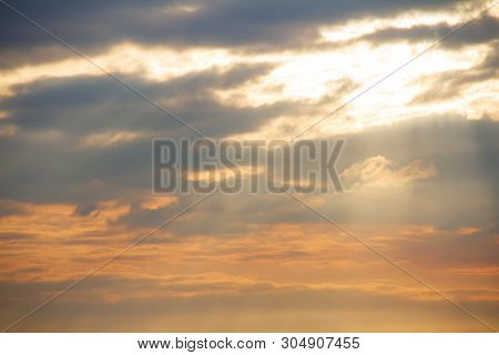 Evening Weather, Golden Cloud And Sky With Sun Light Are Shone Through The Clouds Look Feel Good.