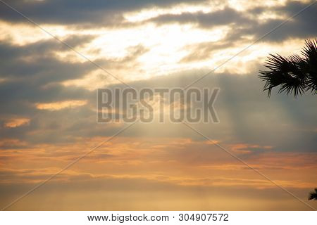 Evening Weather, Golden Cloud And Sky With Sun Light Are Shone Through The Clouds Look Feel Good.