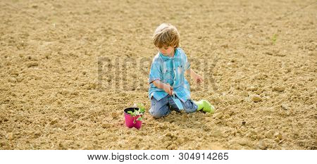 Happy Child Gardener. Botanic Worker. Spring Season. Ecology Life. Eco Farm. Human And Nature. Earth