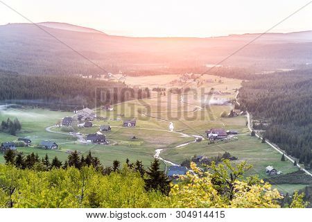 Jizerka Village At Sunset Time. View From Bukovec Mountain, Jizera Mountains, Czech Republic