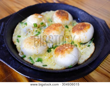 Shengjian Mantou Or Shengjian Bao. Pan-fried Steamed Bun (baozi) Filled With Pork
