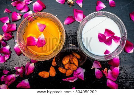 Milk And Almond Face Pack On Black Colored Shiny Surface I.e. Raw Milk,almond,honey Well Mixed In A