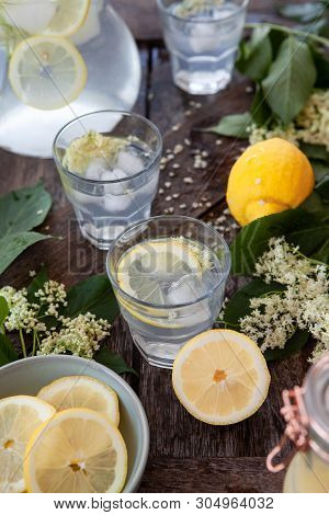 Homemade Lemonade Made With Elderflower Sirup And Slices Of Lemon