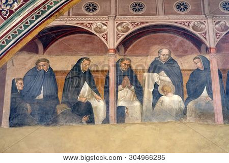 FLORENCE, ITALY - JANUARY 10, 2019: Saint Peter receive the Dominican habit, fresco by Andrea di Bonaiuto in Spanish Chapel, Santa Maria Novella Principal Dominican church in Florence, Italy