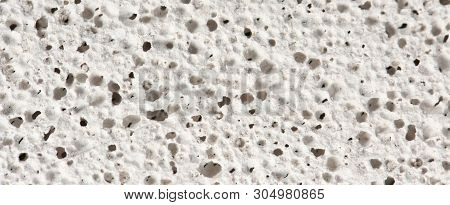 Macro Of Pumice Stone. Grey Porosity Stone, Rough Pumice Texture Background. High Resolution Photo. 