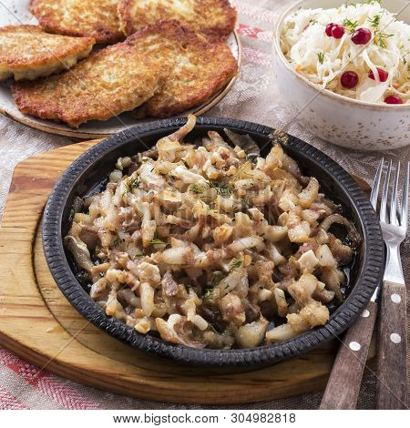 Baked Pork Ears With Sauce And Garlic.
