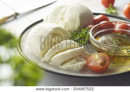 Mozzarella Cheese And Cherry Tomatoes With Spices. Homemade Mozzarella Cheese, Isolated.