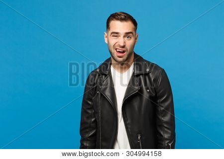 Young Sad Frustrated Worried Unshaven Man In Black Jacket White T-shirt Looking Camera Isolated On B