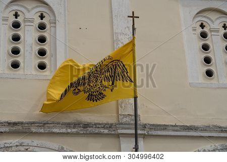 Double-headed Flag On St George Orthodox Church In Old Town In The City Of Nafplio In Greece