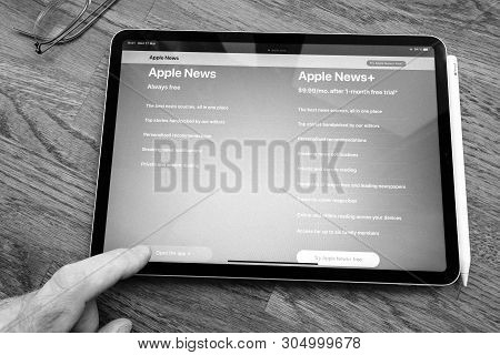 Paris, France - Mar 27, 2019: Pov Personal Perspective On Apple News Webpage Seen On Modern Ipad Pro