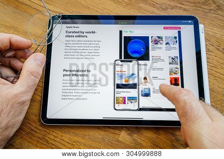 Paris, France - Mar 27, 2019: Pov Personal Perspective On Apple News Webpage Seen On Modern Ipad Pro