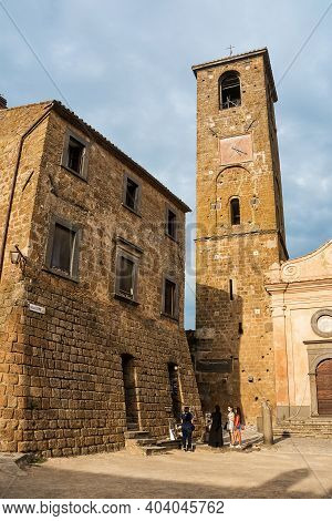 Bagnoregio, Italy - 19 September 2020: Main Square With Tourists And San Donato Church In Civita Di 