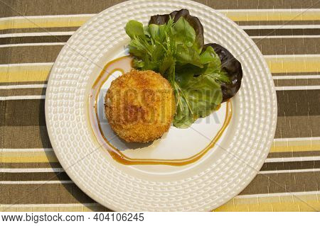 Ballotine De Chevre (goat Cheese, French) Fried With Honey Sauce.