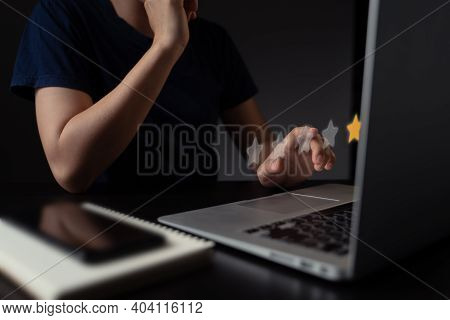 Woman Using Laptop Present Star Icon Hologram Effect.