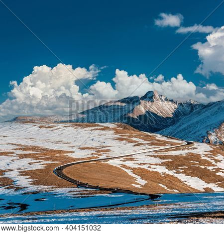 Trail Ridge Road, the highest (12,183 feet) continuous highway in the USA in high alpine tundra with rocks and mountains at autumn. Rocky Mountain National Park in Colorado, USA. 
