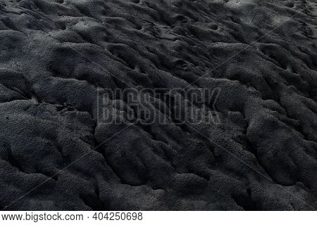 Landscape With Black Sand, With Shapes And Textures.