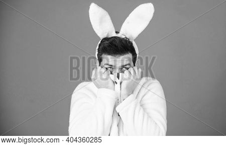 Soft And Tender. Guy With Long Bunny Or Rabbit Ears On Violet Background. Enjoy Tenderness. Cute Bun