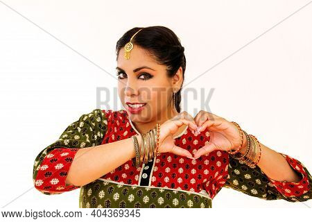 Woman Dancing Indian Dance In National Dress. A Beautiful Girl Portrait In Shree Kurta Patiala Set S