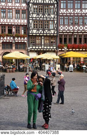 Frankfurt, Germany , September 3 2015: Tourist Chinese People Taking Photos At The Famous Historical
