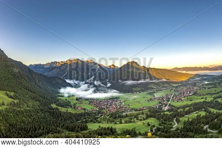 Aerial View Of German Village Bad Oberdorf At Sunrise Near Zugspitze And Austria Border