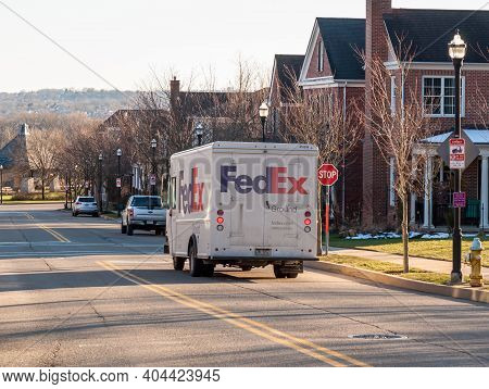 Pittsburgh, Pennsylvania, Usa 1-21-21 A Fedex Truck At A Stop Sign In The Summerset Neighborhood On 