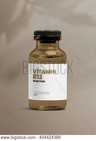 Vitamin B12 injection amber glass bottle with luxurious label for health and wellness product packaging