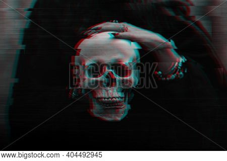 Skull Of A Dead Man In The Hands Of A Witch Witch