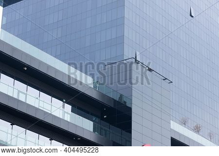 Black Windows, The Facade Of A Modern Office Building, A Shopping Center In A Megapole.