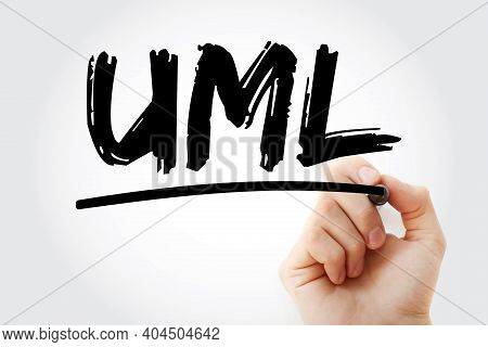 Uml - Unified Modeling Language Acronym With Marker, Technology Concept Background