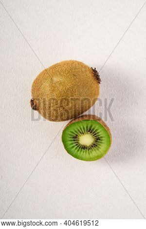 Kiwi Fruits Half Sliced On White Background, Macro